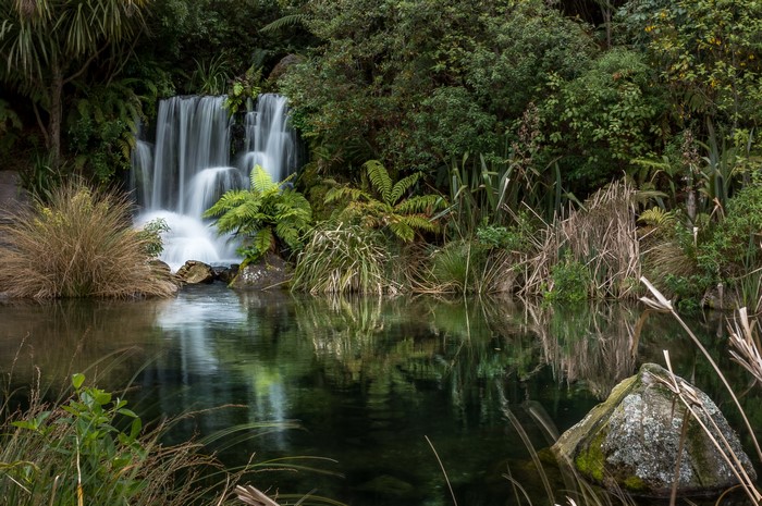 Waterfall in a New Zealand Park with Stones