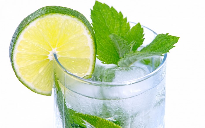 Mojito with lime and mint in a highball glass
