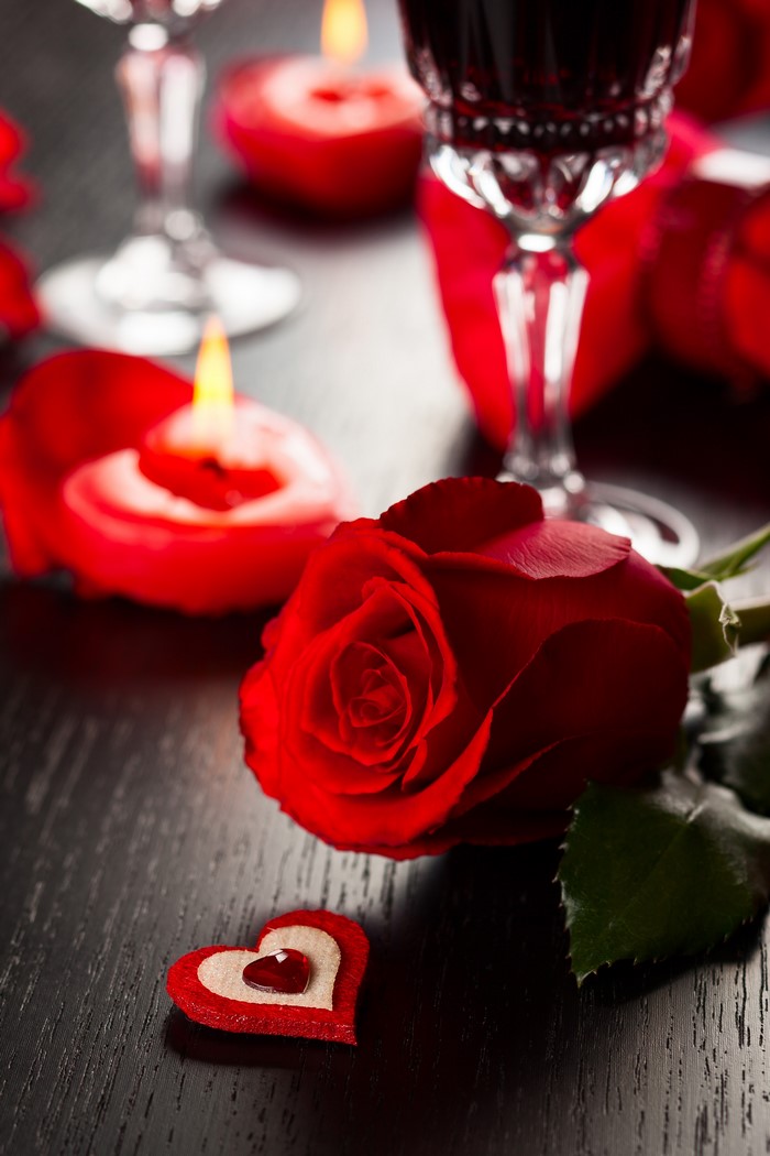 Valentine's Day romantic setting with rose and candles