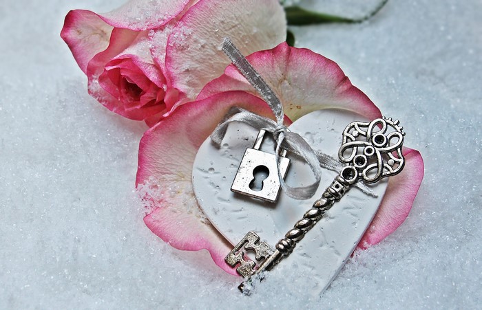 Rose, Heart, Lock, and Key on Snow