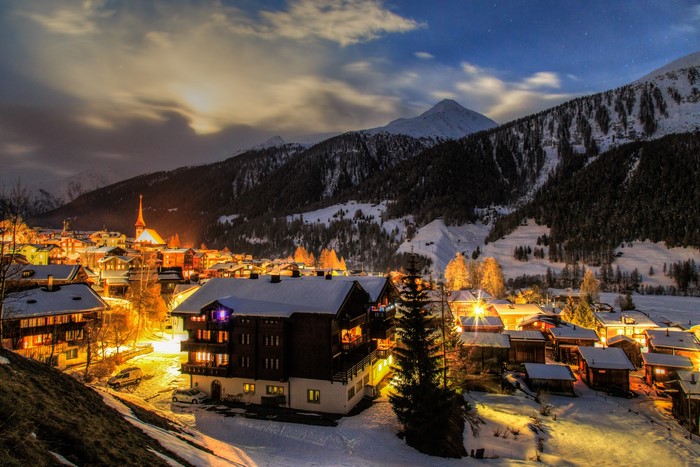 Goms, Switzerland: Winter Evening in a Snowy Mountain Village