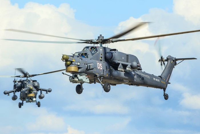 Two Russian Mi-28N helicopters in flight