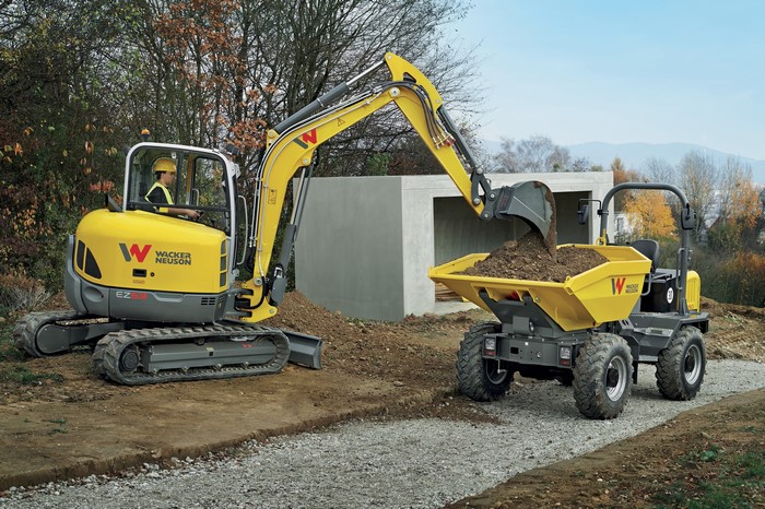 Wacker Neuson EZ53 Excavator loading Wacker Neuson DW50