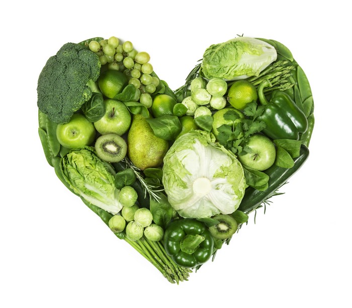 Heart shape made of green fruits and vegetables