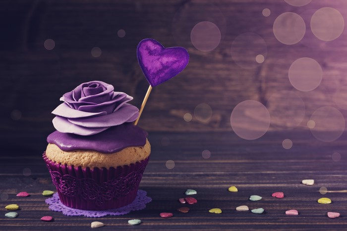 Purple Rose Cupcake with Heart Topper on Wood
