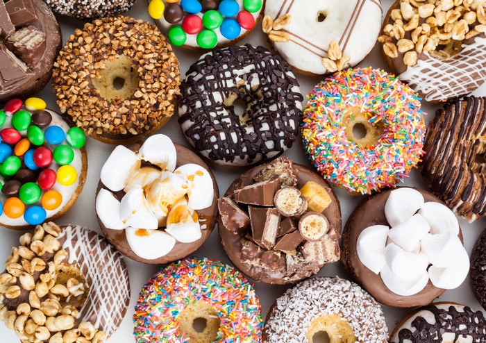 Assortment of Donuts with Various Toppings