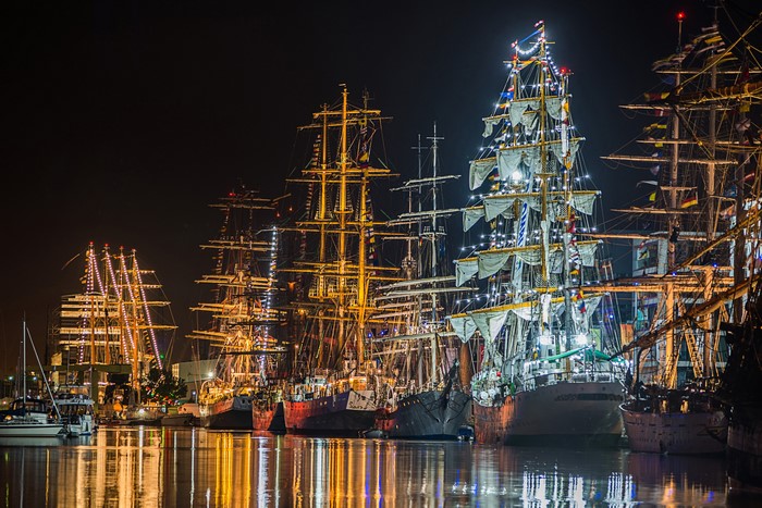 Tall Ships Decorated with Fairy Lights at Night in Bremerhaven