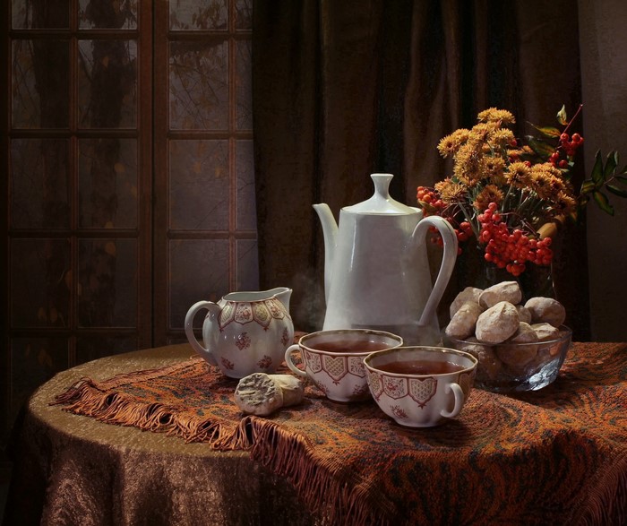Still-life with tea set, cookies, and flowers
