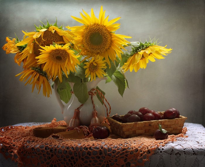 Still-life with sunflowers, plums, and a vase