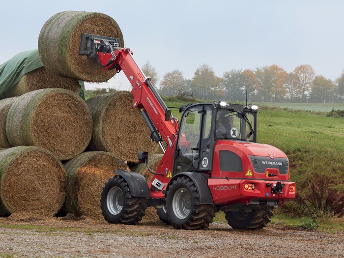 Weidemann 4080LPT forklift loading hay bales