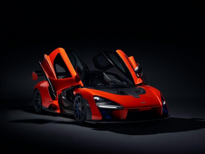 McLaren Senna with opened doors on black background