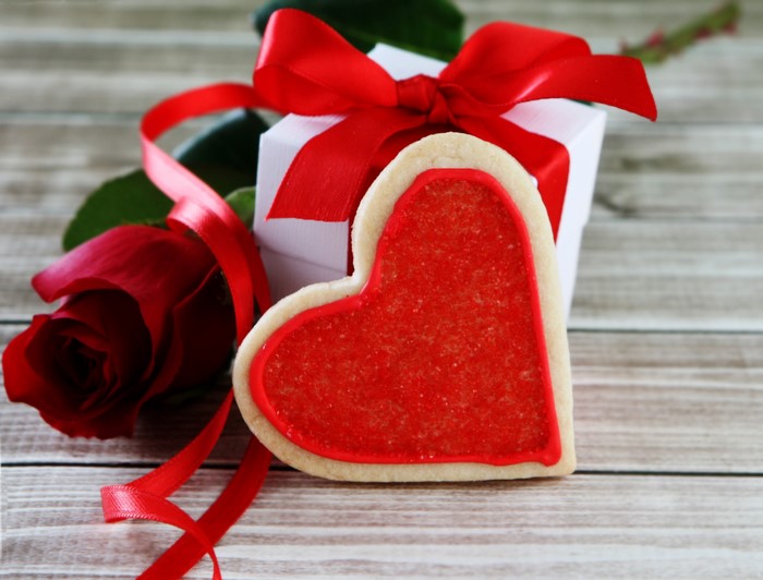 Valentine's Day heart cookie with rose and gift