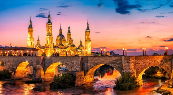 Basilica of Our Lady of the Pillar and Stone Bridge at Dusk