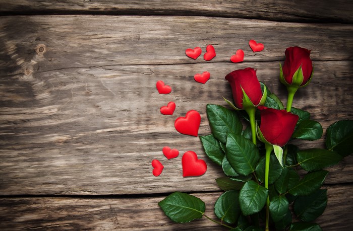 Red Roses and Hearts on Wood Planks
