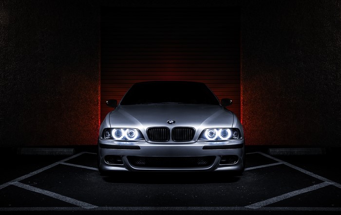 Silver BMW E39 540i parked in a garage