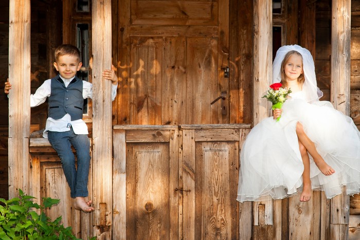 Boy and Girl Dressed as Bride and Groom
