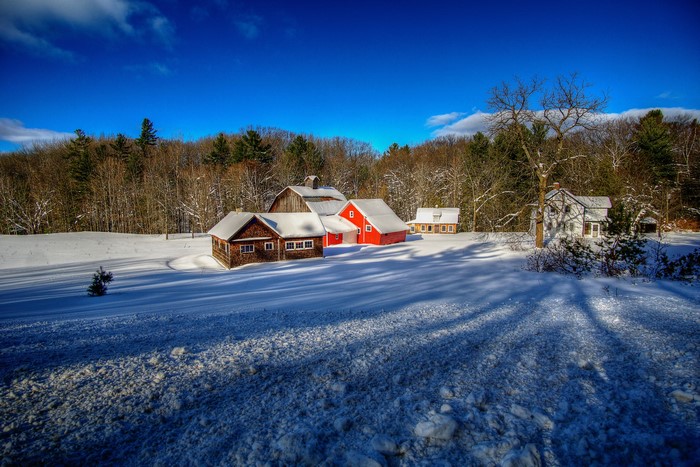 Barns and house in snowy Leelanau, Michigan