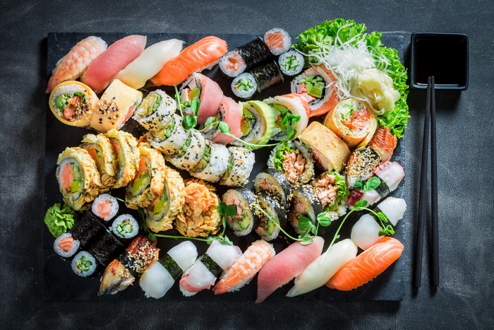 Assortment of Sushi and Rolls on a Slate Platter