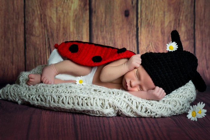 Baby in Ladybug Costume Sleeping