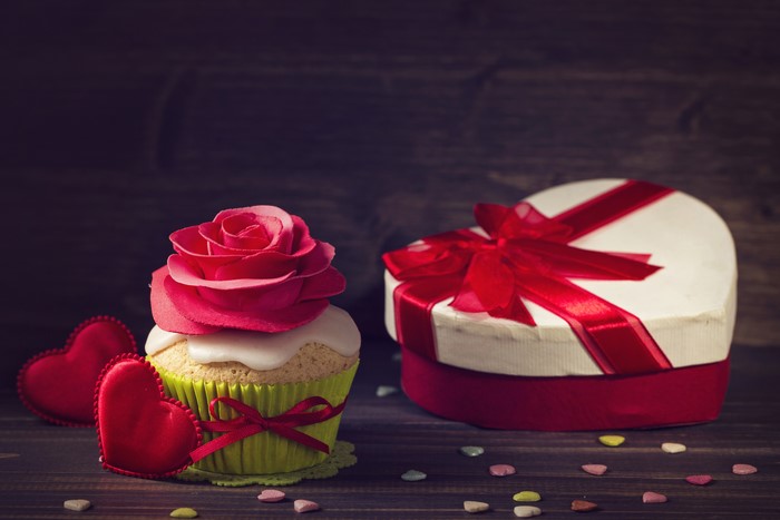 Valentine's Day cupcake with rose and heart gift box