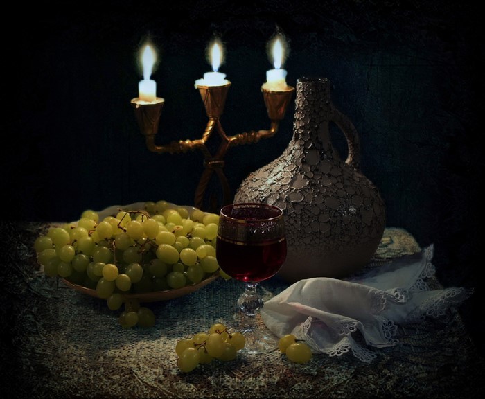 Still-life with grapes, wine, candles, and jug