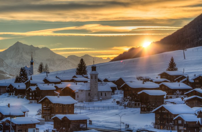Winter village in Gluringen Goms, Switzerland at sunset