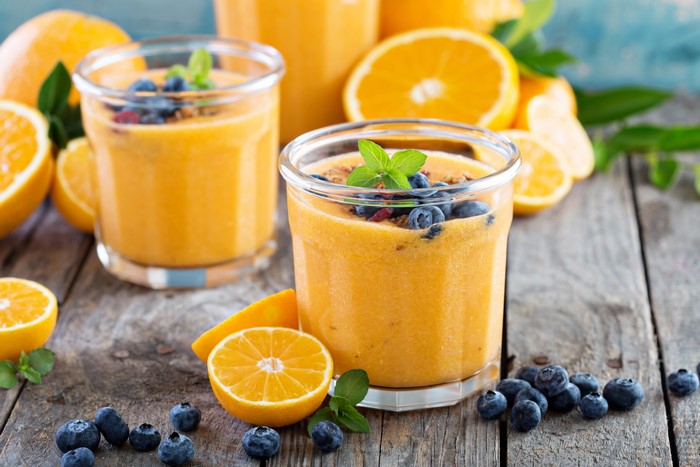 Orange juice smoothie with blueberries and oranges