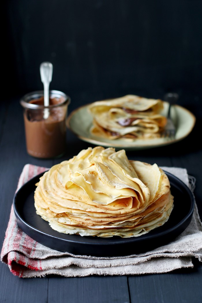 Stack of crepes with chocolate spread