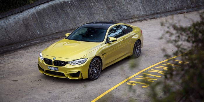 Yellow BMW M4 Coupe