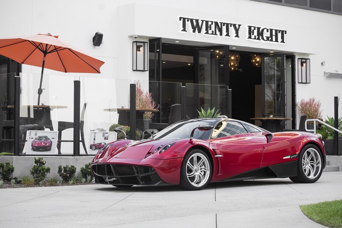 Red Pagani Huayra parked outside Twenty Eight restaurant