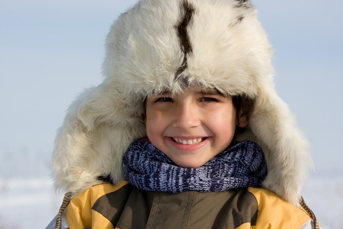 Boy in a winter hat and scarf