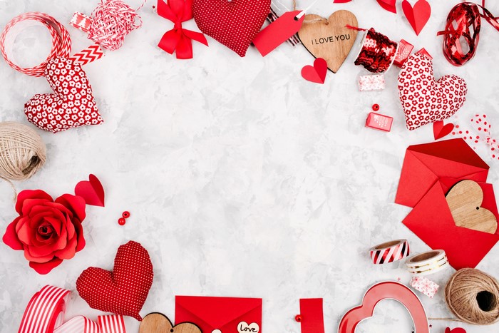 Valentine's Day craft supplies with hearts and ribbons