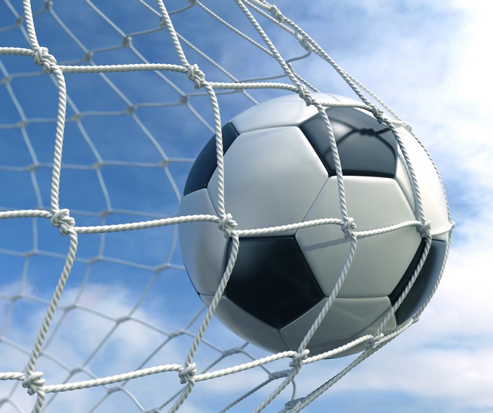 4K Soccer Ball in Net