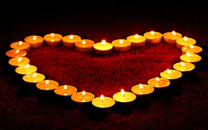 Heart shape made of tea light candles
