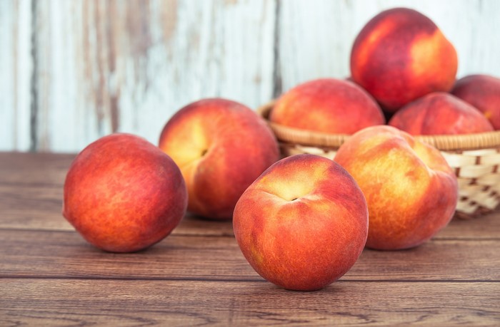 Peaches on a wooden table