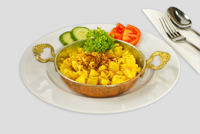 Scrambled eggs with potatoes and vegetables