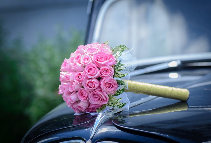 Pink Roses Bouquet on a Car