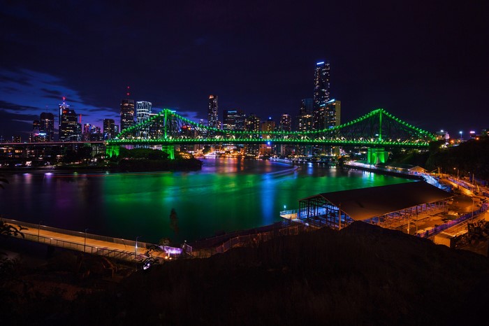 Story Bridge illuminated green at night in Brisbane, Australia