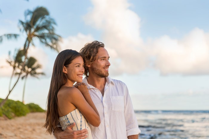 Couple on a Beach with Palm Trees