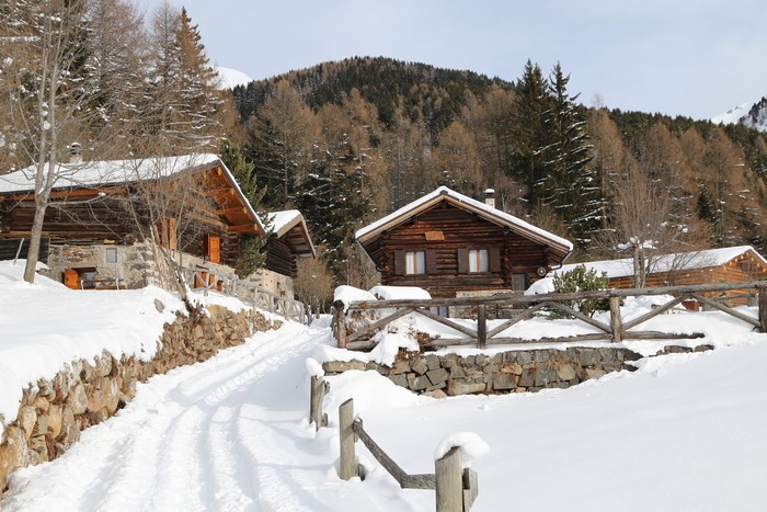 Wooden houses in Alta Badia, Italy during winter