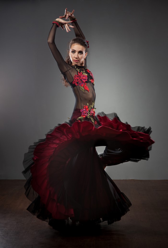 Flamenco dancer in a black and red dress