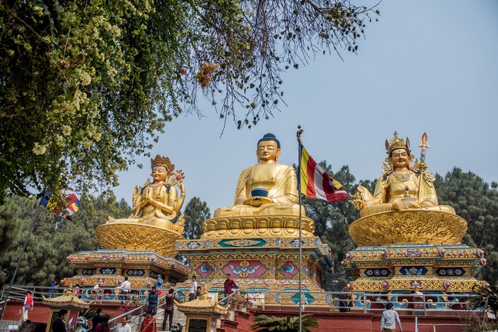 Three Golden Buddha Statues at Swayambhunath Nepal