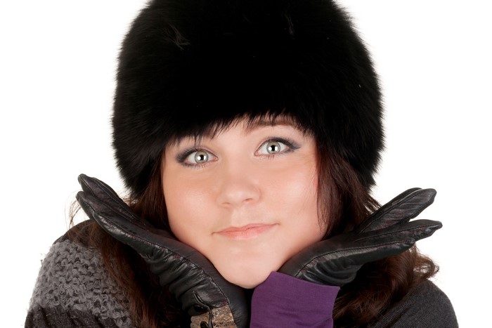 Woman in winter hat and gloves