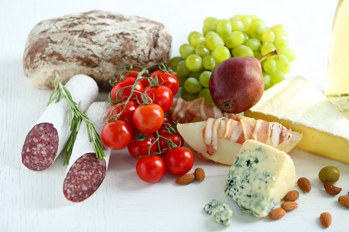 Still-life of Sausage, Cheese, Bread, and Fruit