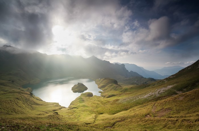 Lake and mountains in Austria with sunbeams