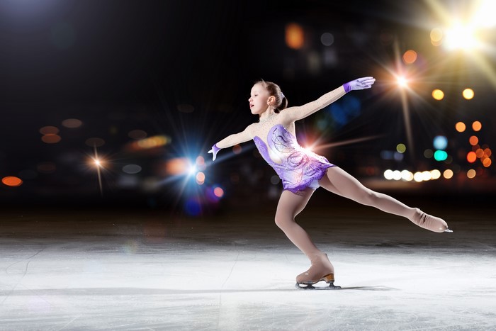 4K Young Girl Performing Ice Skating Pose