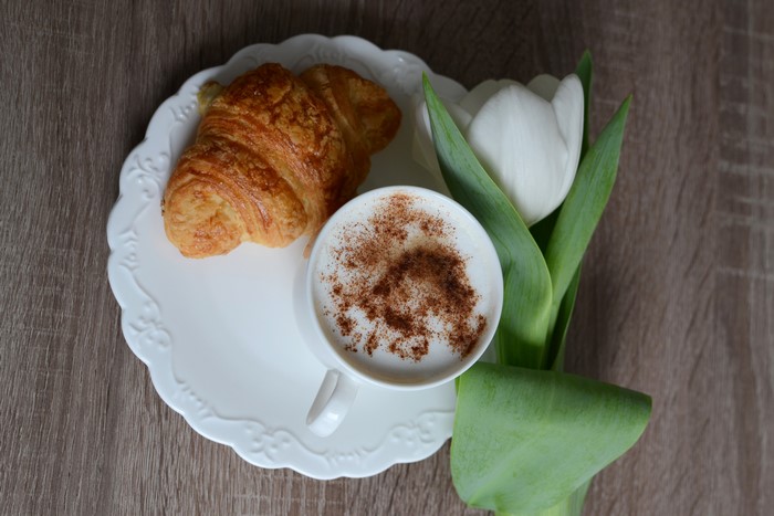 Cappuccino, Croissant, and Tulip on a Plate