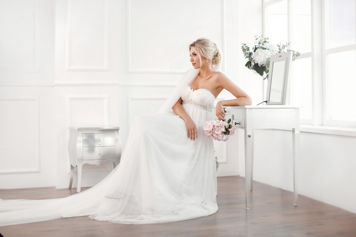 Bride in a white dress with a bouquet
