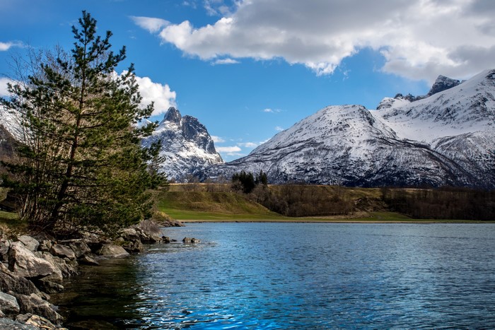 Lake and snow-capped mountains in Andalsnes, Norway