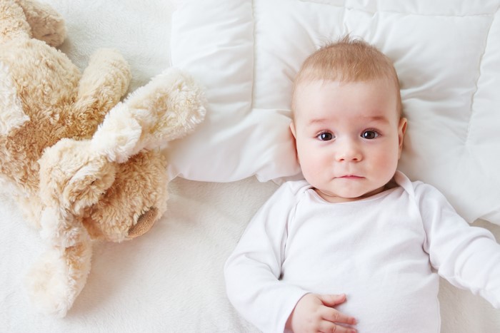 Baby with a stuffed toy